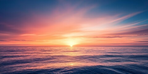 A breathtaking sunset with vibrant colors painted across the sky reflecting on the serene and expansive ocean waters.