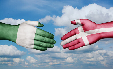 Denmark and Nigeria country handshaking with flags, consensus concept international co-operation illustration