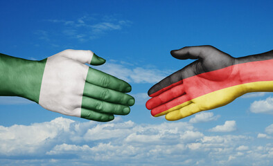 Germany and Nigeria country handshaking with flags, consensus concept international co-operation illustration