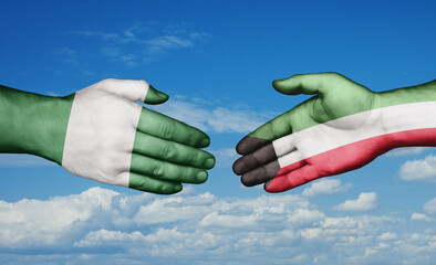 Kuwait and Nigeria country handshaking with flags, consensus concept international co-operation illustration