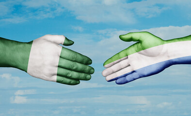 Sierra Leone or Salone and Nigeria country handshaking with flags, consensus concept international co-operation illustration