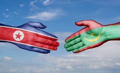 Mauritania and North Korea country handshaking with flags, consensus concept international co-operation illustration