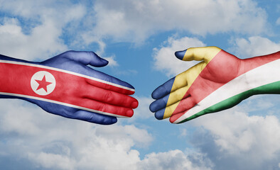 Seychelles and North Korea country handshaking with flags, consensus concept international co-operation illustration