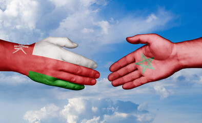 Morocco and Oman country handshaking with flags, consensus concept international co-operation illustration