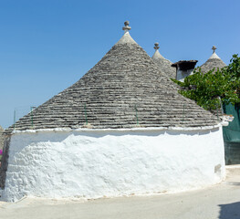 Traditional trulli houses with conical roofs in alberobello, puglia, italy