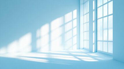 A minimalistic abstract light blue background, perfect for product presentations. Soft shadows and light from windows create a subtle effect on the wall, adding depth and dimension to the scene. The c