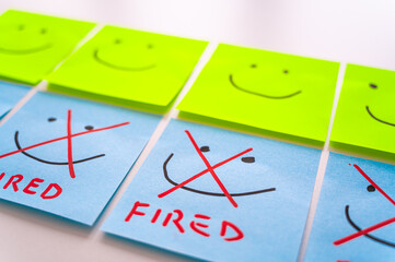 Sheets of paper with smiley faces drawn on them, some with an x ​​drawn on them and the text...