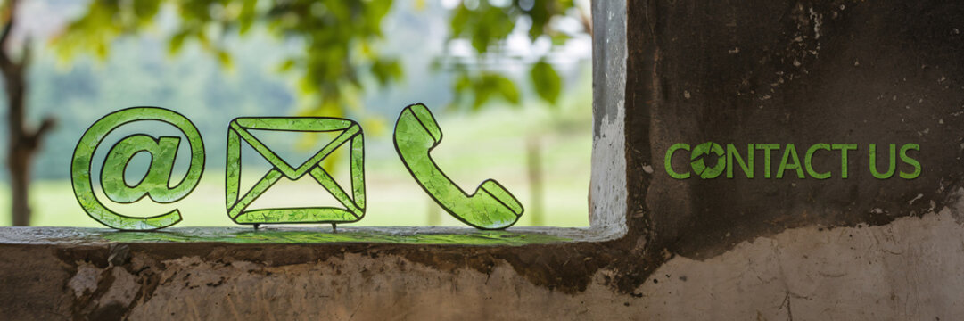 "Contact Us" Icons Embedded in Natural Setting with Old Stone and Greenery