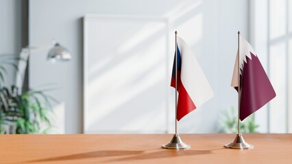 FLAGS OF CZECH REPUBLIC AND QATAR ON TABLE