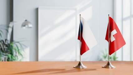 FLAGS OF CZECH REPUBLIC AND SWITZERLAND ON TABLE