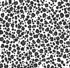 Obraz premium A seamless pattern of small leopard spots