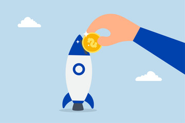 venture capital investment, Businessman and investor place money coins into an innovative rocket in order to launch their company.
