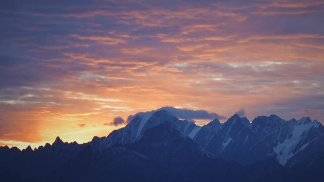Zoom in Timelapse Sunset mountain Violet purple sky beautiful landscape on dusk golden time dramatic sky. Time lapse Beautiful landscape motion high mountain ridge mist panorama scenery purple sky