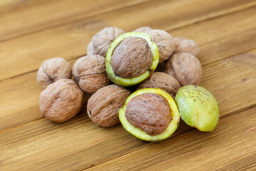 Walnuts on an old wooden table, close-up