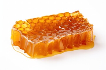 A close-up shot of a honeycomb filled with glistening amber honey