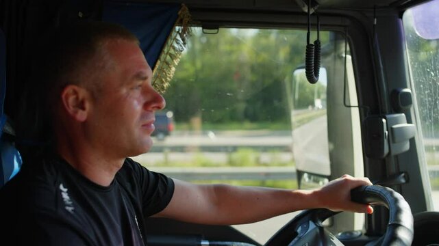 Close-up of a trucker's face driving a truck. High quality 4k footage