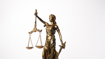 statue of Themis, the Greek goddess of justice on a white background. concept of justice