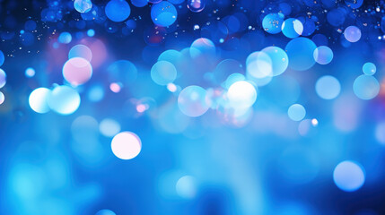 Blur bookeh colorful lights or flashes on a vivid blue color background