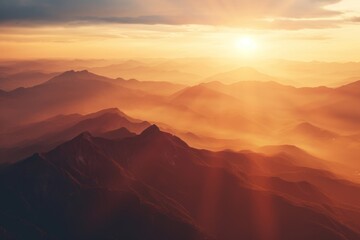 Naklejka premium Mountains at sunrise backgrounds landscape sunlight.