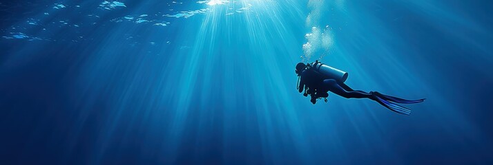 Fototapeta premium Diver in deep sea