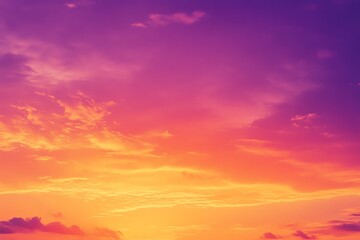 Obraz premium Vibrant sunset with a stunning blend of orange, pink, and purple hues lighting up the sky, capturing the beauty of nature's evening show.