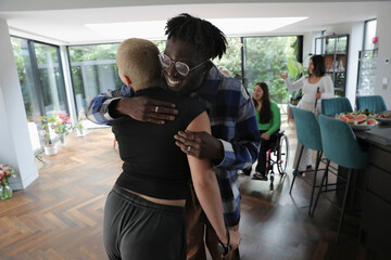 Group of friends meeting at home