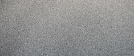 A soft, grainy texture in a black and grey gradient, with a blurred noise effect suited for dark design elements like banners or posters.