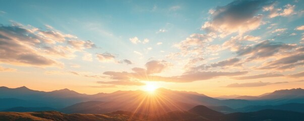 Fototapeta premium Breathtaking sunrise over mountains with colorful clouds in clear sky.