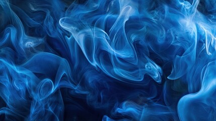 Obraz premium An abstract composition of swirling blue smoke, creating a mystical and ethereal atmosphere.