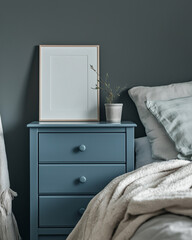 A empty poster in frame above a bed. AI generated