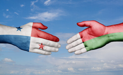 Madagascar and Panama country handshaking with flags, consensus concept international co-operation illustration