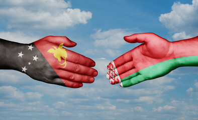 Belarus and Papua New Guinea country handshaking with flags, consensus concept international co-operation illustration
