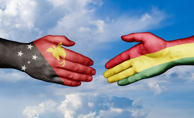 Bolivia and Papua New Guinea country handshaking with flags, consensus concept international co-operation illustration