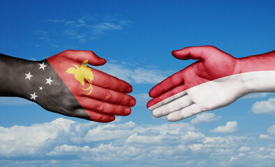 Indonesia and Papua New Guinea country handshaking with flags, consensus concept international co-operation illustration