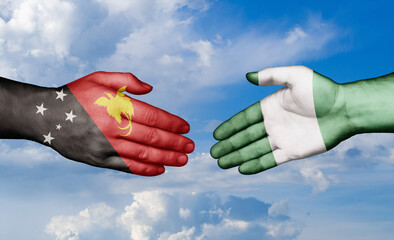 Nigeria and Papua New Guinea country handshaking with flags, consensus concept international co-operation illustration