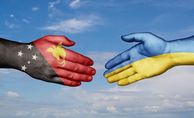 Ukraine and Papua New Guinea country handshaking with flags, consensus concept international co-operation illustration