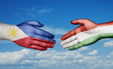 Hungary and Philippines country handshaking with flags, consensus concept international co-operation illustration