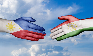 Tajikistan and Philippines country handshaking with flags, consensus concept international co-operation illustration