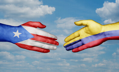 Colombia and Puerto Rico country handshaking with flags, consensus concept international co-operation illustration