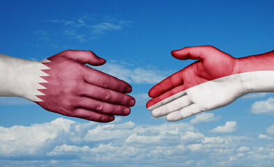 Indonesia and Qatar country handshaking with flags, consensus concept international co-operation illustration