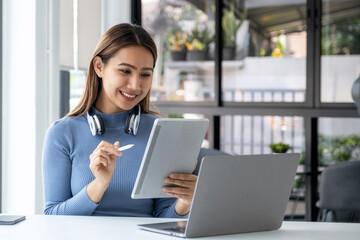 Businesswomen bookkeepers use tablet to analyze the graph to set challenging business goals and be ready to achieve targets at home