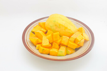 Peeled mango on a white background