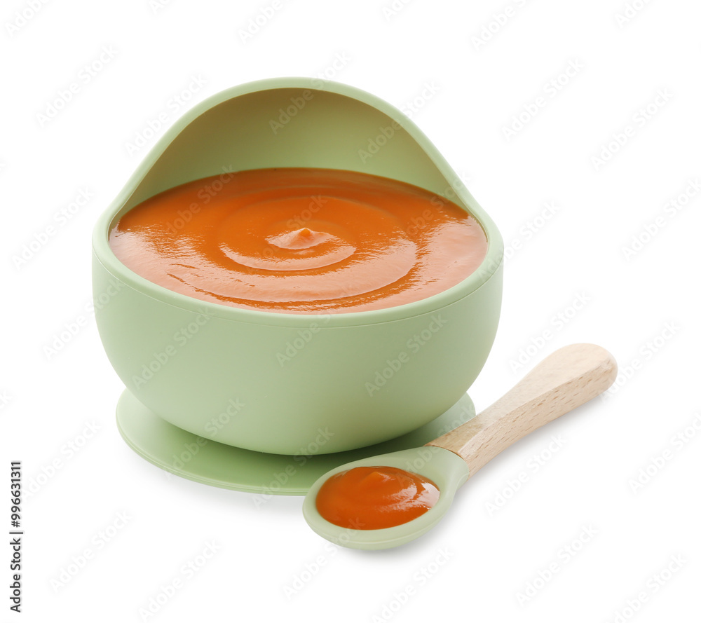 Sticker tasty baby food in bowl and spoon isolated on white