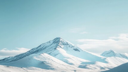 Minimalist mountain range with snow capped peaks against a clear blue sky.