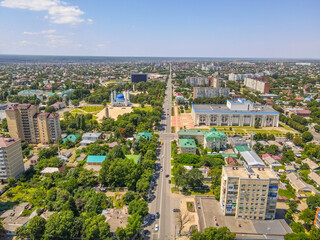 The aerial city view of Maykop, Adygea republic of Northern Caucasus of Russia, with the road, parks, Soviet residential buildings.
