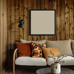 Mockup of a 1x1 black square frame in a rustic living room with a sofa and wooden walls. Artwork, poster, art print, wall art mockup. Cottage, farmhouse home interior.
