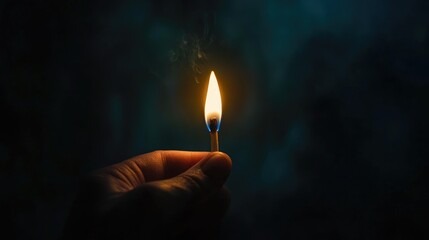 A lit match against a dark backdrop