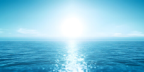 Obraz premium A bright blue background of a warm spring, summer sky and distant horizon over a blue ocean or sea with light reflecting off the surface from sun flare on the right.