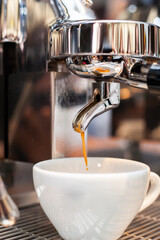 Close shot for preparing coffee in coffee machines, no face