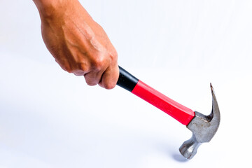 Man hand holding a hammer with a handle covered in black and red rubber Cut Out, isolated on white background. Old rusty hammer. with clipping path